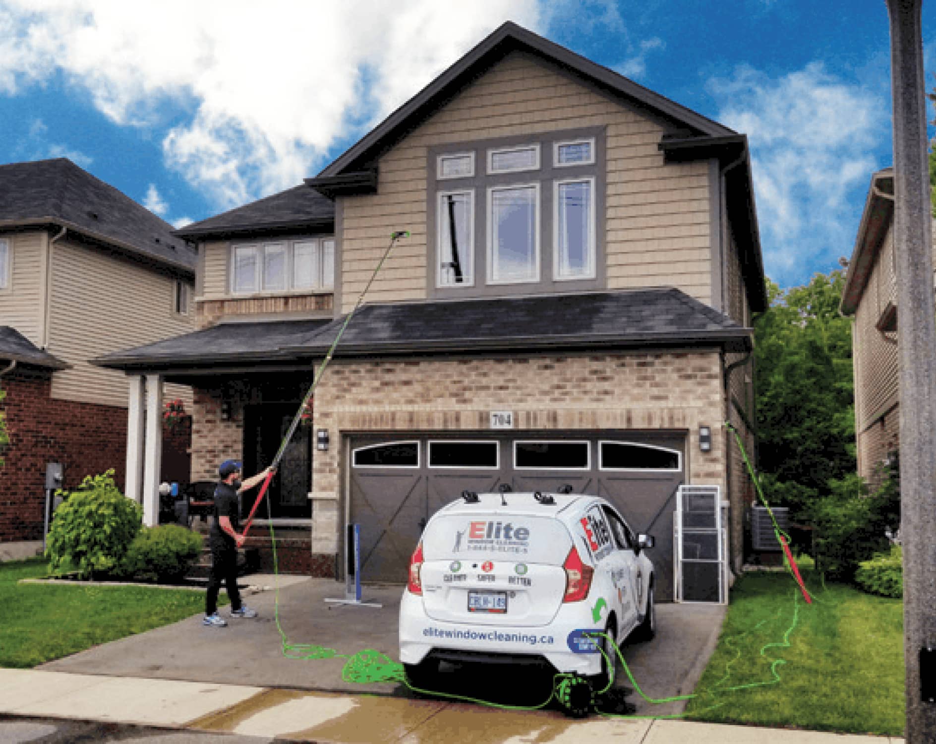 Cleaning process going on by worker for gutter cleaning in Pickering